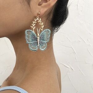 Anthropologie Gold Leaf Earrings with Light Blue Butterfly
